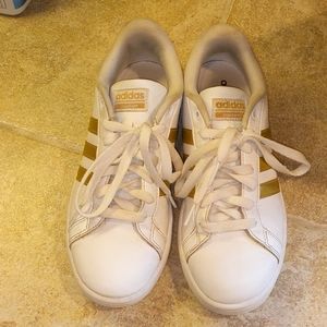 Adidas women's gold Cloud Foam sneakers